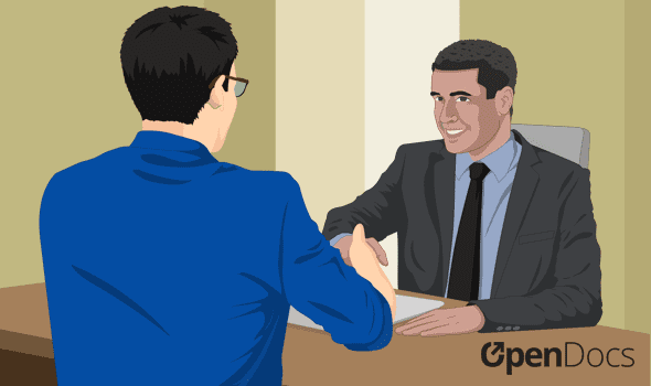 An employee shaking hands with an employer after being hired.